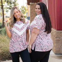 Boutique Simplified Chasing Arrows Short Sleeve Top