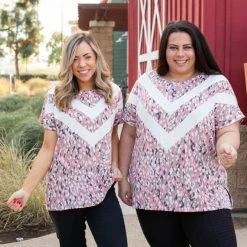 Boutique Simplified Chasing Arrows Short Sleeve Top