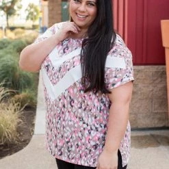 Boutique Simplified Chasing Arrows Short Sleeve Top