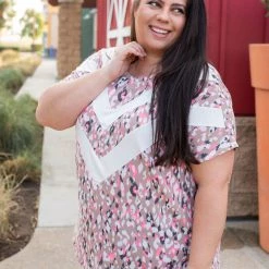 Boutique Simplified Chasing Arrows Short Sleeve Top