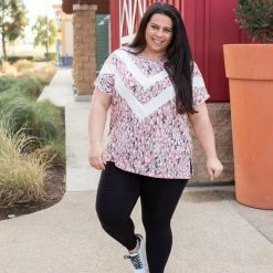 Boutique Simplified Chasing Arrows Short Sleeve Top