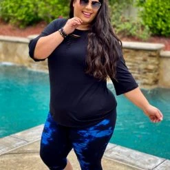 Boutique Simplified Laser Cut Tunic In Black