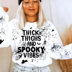 Iris & Rainbow Boutique #K668 Thick Thighs & Spooky Vibes Sweatshirt